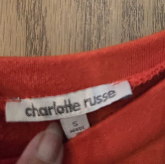 Very cute, long sleeve, orange sweat shirt with white stripes on the sleeves. - Picture 2 of 4